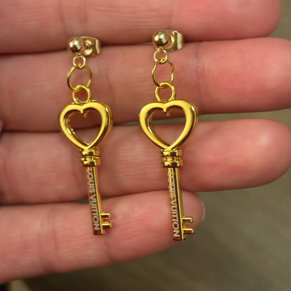 Gold lv earrings